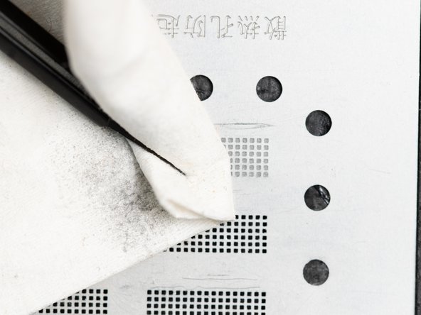 If all of the holes are filled in, clean the stencil with a cloth to get rid of any solder paste residue. Cleaning it also helps push the solder paste around the small holes in the stencil. This helps it sit in the right place, you may want to use firm pressure when doing this.