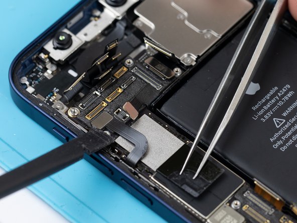 Using a spudger or your fingernail, disconnect the power volume NFC flex.