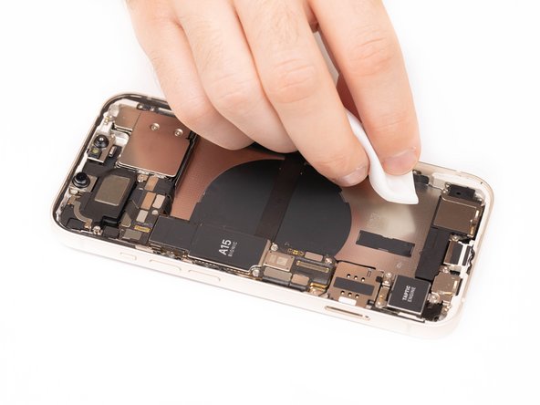 Apply the IPA to a clean cloth and wipe down the inside of the phone where the battery had previously been sat.