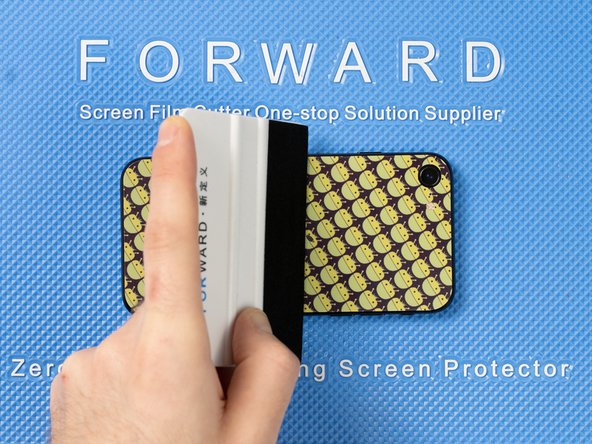 Run your application tool across the entire back film to ensure it's bonded well with the back of your phone.