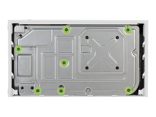 Remove the seven 51 mm-long screws securing the chassis to the plastic case.