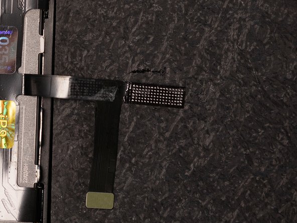 Apply some flux to the digitizer flex. This will help bond the IC to the flex.