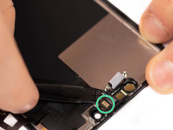 Using tweezers, lift the microphone out from it's socket.