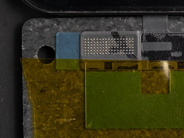 Rest the touch screen digitizer flex on your re-balling base and put a piece of Kapton tape across the flex cable. This is just to prevent any movement in the flex in the next steps.