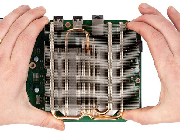 Flip the motherboard over.