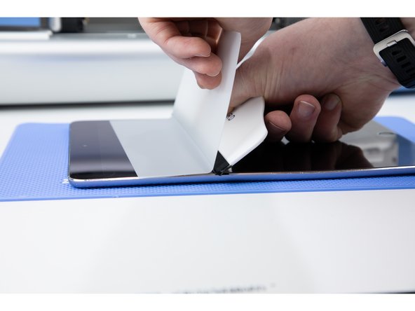 Using the same process as step 18, apply the film to the iPad.