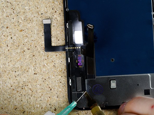 Continue working your way down the flex prying gently in a back and forth motion.