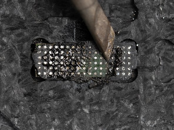 The most efficient way of removing the underfill is with the soldering iron on a slant and rubbing it in an up &amp; down motion.