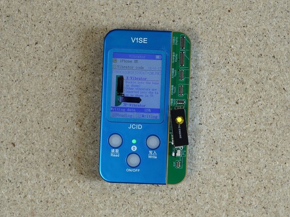 Attach the aftermarket taptic engine and click writing. Once complete, unattach  the taptic engine.