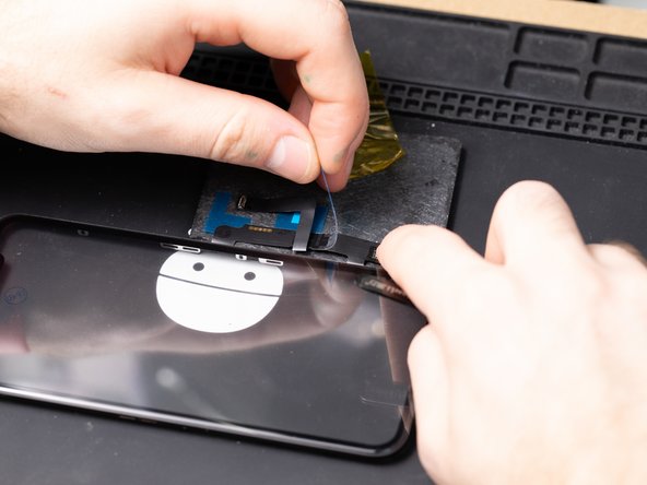 You'll need to re-apply the Kapton tape after removing the blue films and adhesive.