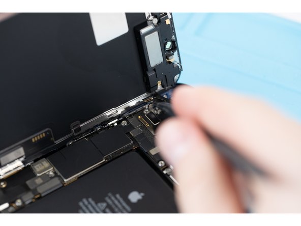 Disconnect the front sensor assembly cable connector with a spudger or your fingernail.