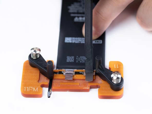 Mark the plates with a spudger to give yourself a rough guide of where to cut.