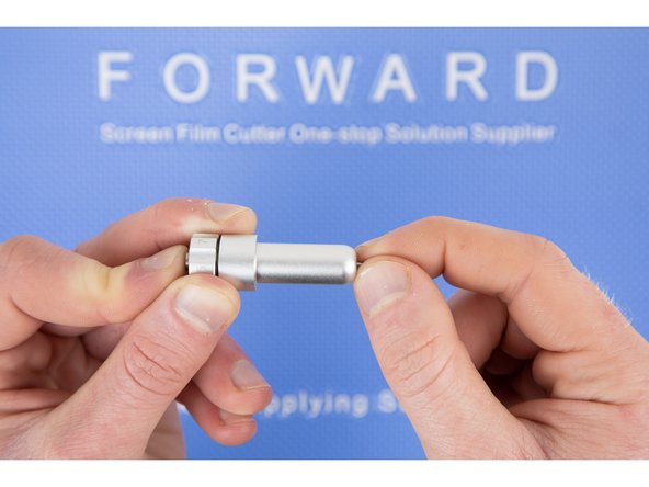 Remove the blade from the blade holder by pulling it out slowly.