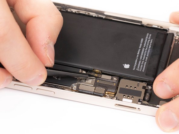 Disconnect the sim reader flex from it's socket.