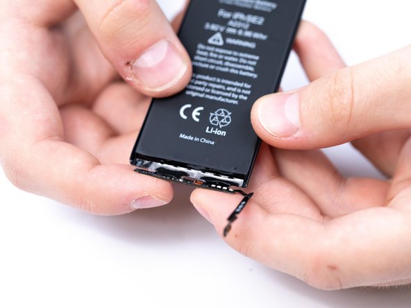 Fold the BMS board into place.