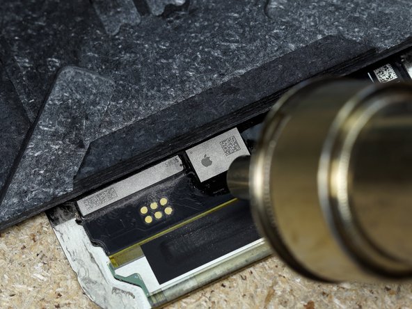 Heat the IC with hot air in a back and forth motion.