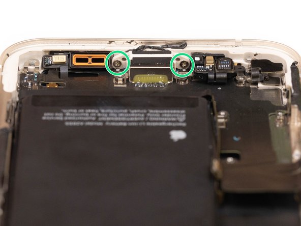 Remove the two screws holding the charge port to the bottom of the iPhone case.