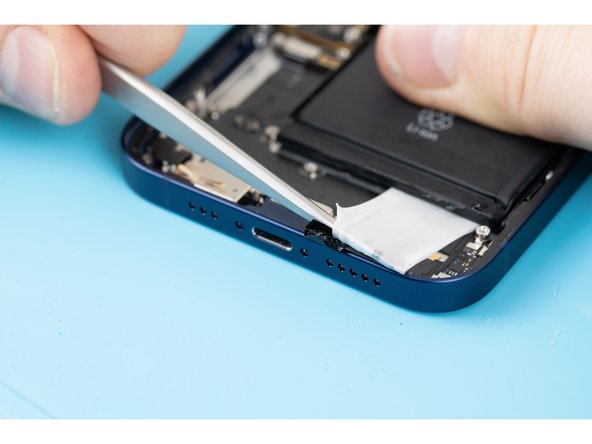 Apply enough tension for the adhesive to begin unsticking, but don't pull too hard that it rips.