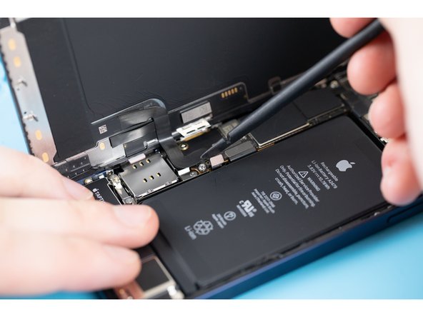 If you don't have a spudger, you can use your fingernails, but make sure they're clean.