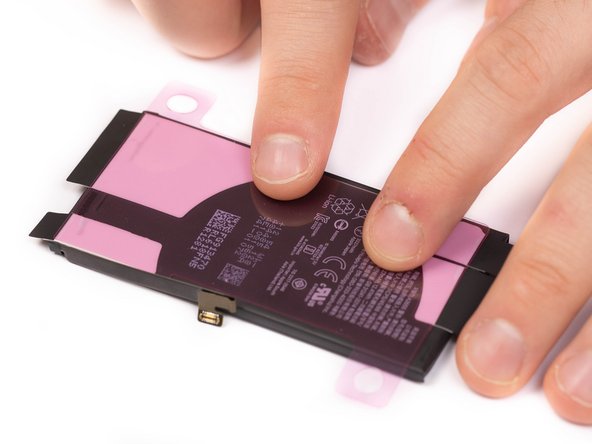 Using your fingers, firmly press the adhesive strips into place.