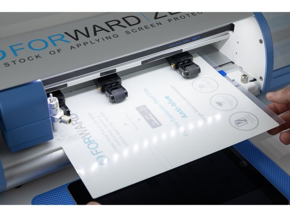 Load your film into your machine, making sure it loads in straight.