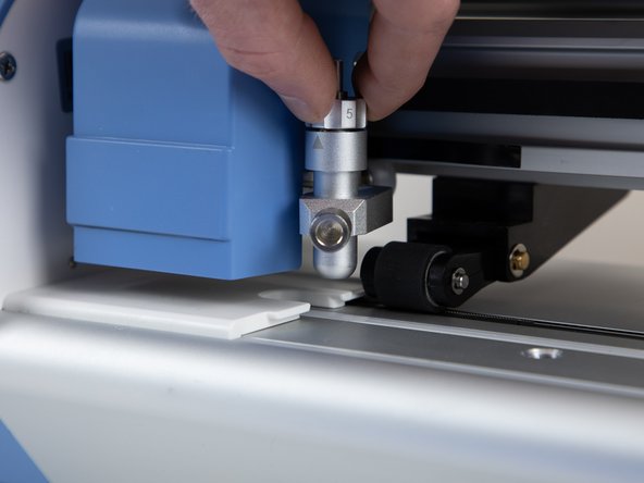 Re-tighten the blade holder and make sure it isn't loose.