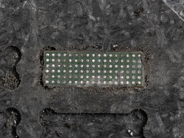 Once you've finished removing the underfill on one side, switch to the next side and remove all of the underfill.