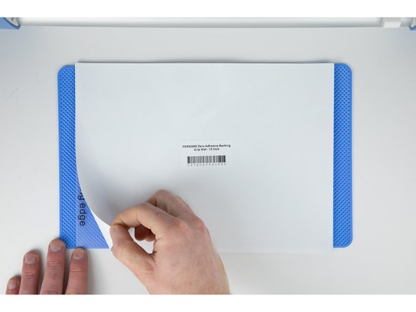 When cutting a 13 inch film you'll need to use a grip layer. The grip layer acts as a solid layer and helps keep the film still when cutting.