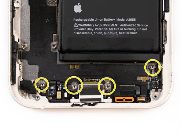 Remove the four screws holding down the charge port.