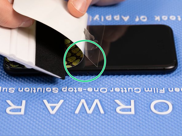 As you can see in this step, by peeling the back film backwards, it splits the bottom of the film to expose the next sticky layer.