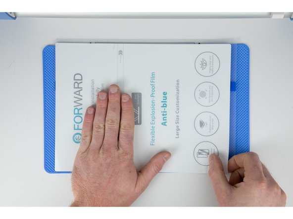 Try and get your film lined up as accurately as you can and stick it down.