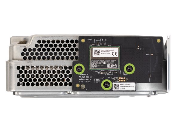 Remove the three 9.5 mm-long screws securing the Wi-Fi board to the short edge of the chassis.