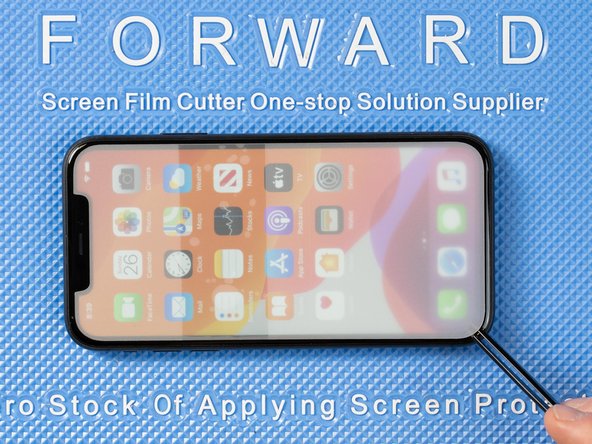 Once you're happy that your front film is in the correct position. You can start peeling the film back to expose the next sticky layer.