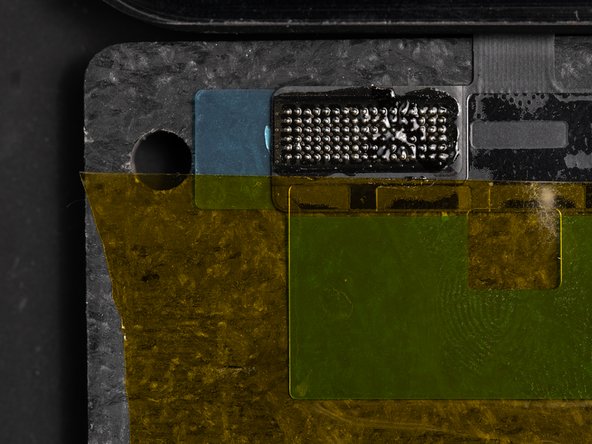Apply some flux to the digitizer flex. This will help melt the solder joints in the next steps.