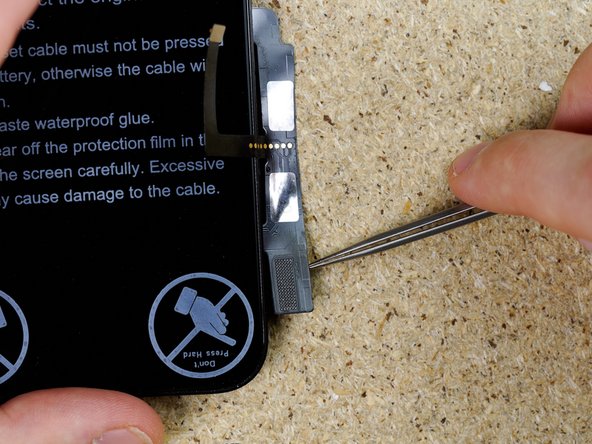 Turn over the display. You are now ready to begin prepping the solder pads to fit the new IC. You can do so by heading to step 30 on this guide.