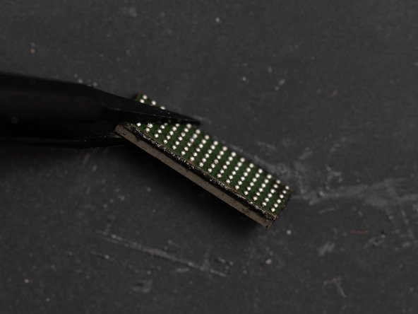 When inspecting the chip with the newly applied solder paste you're looking for all of the balls to be on the same level as eachother.