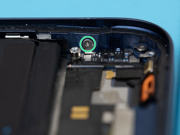Remove one screw on the power button side of the phone.