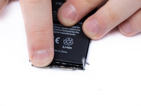 Gently unfold the BMS with a spudger.