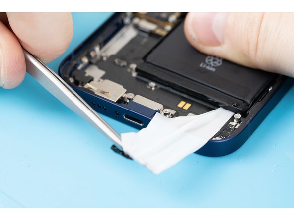 For the best grip on the adhesive, keep twisting the adhesive onto the tweezers, that way the pressure you're applying will remain consistent/even across the adhesive.