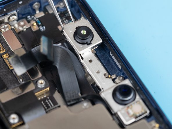 Lift the cameras out from the iPhone.