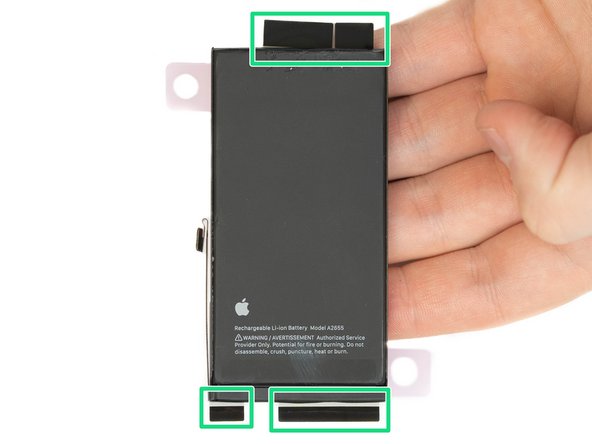 Using your finger, fold the four black tabs into place. Do this for every black tab.