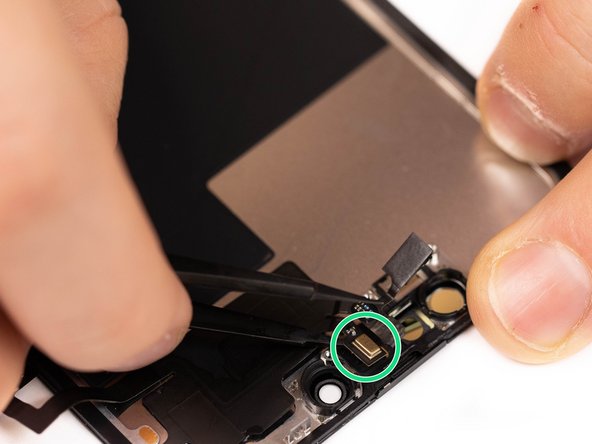 Using tweezers, lift the microphone out from it's socket.