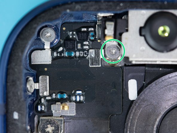 Remove the 1mm screw securing the front-facing camera with a Y000 screwdriver.
