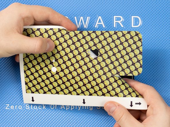 Peel away the back cover from the film.