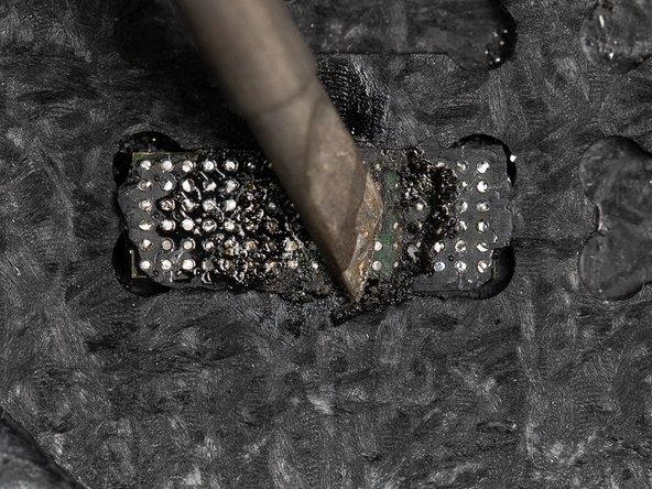 The most efficient way of removing the underfill is with the soldering iron on a slant and rubbing it in an up &amp; down motion.