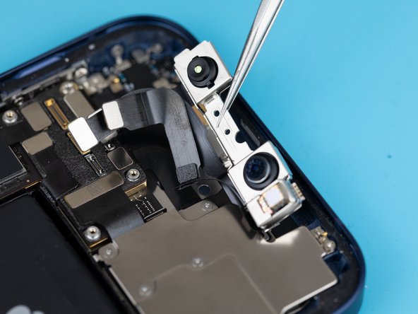 Lift the cameras out from the iPhone.