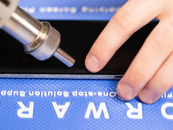 If your phone has curved edges then use a little heat on the edges and fold the film down with you fingers to help it stick to the curved edges.