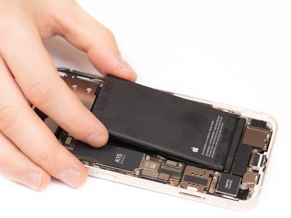 Remove the battery using your fingers.