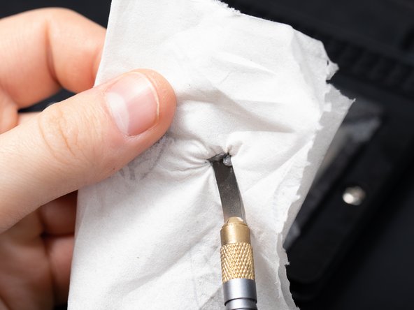 Next, dry the solder paste on a piece of tissue.