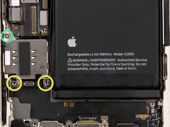 Using a screwdriver, remove the three screws securing the SIM card reader down.